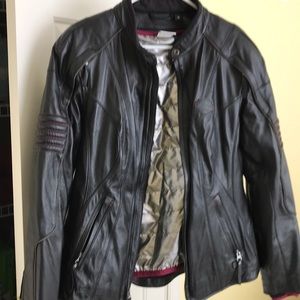 Ladies  XL Harley Davidson leather  w/ rem lining